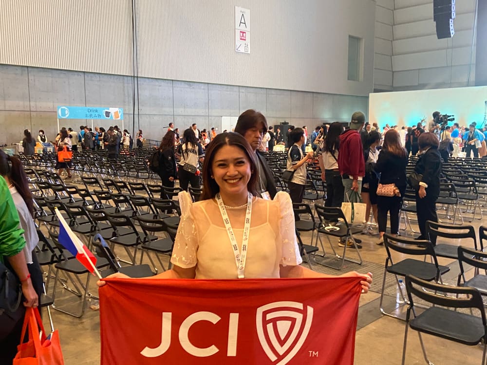 President with the JCI Boholana Kisses flag at ASPAC