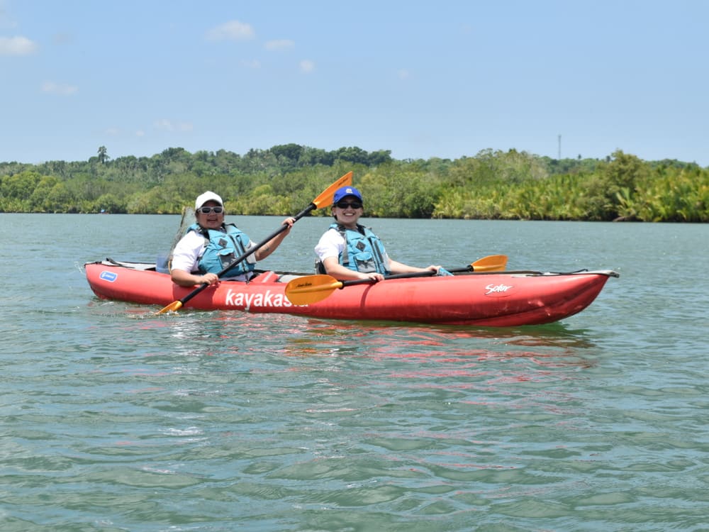 Members kayaking along Bohol waterways