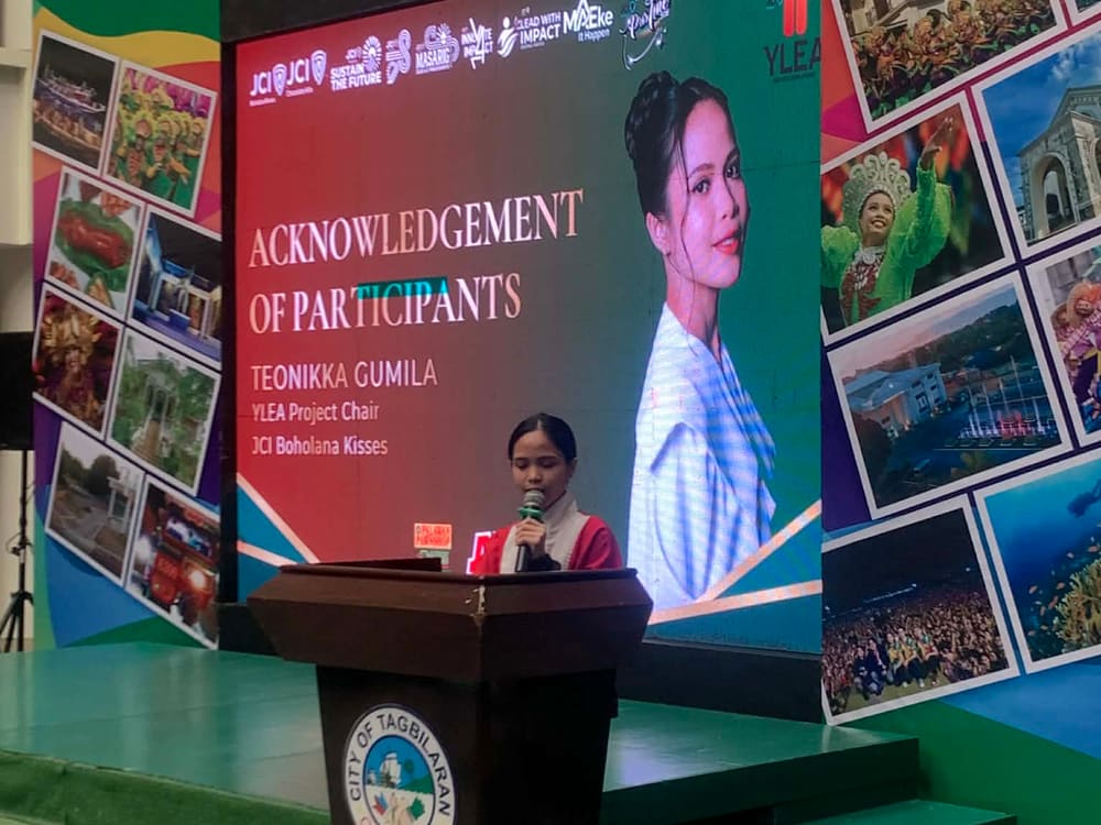 A speaker addressing the YLEA ceremony